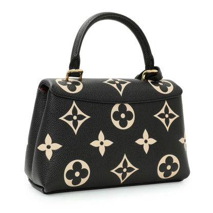 Exclusive Louis Vuitton Empreinte Monogram Giant Madeleine BB — Side View