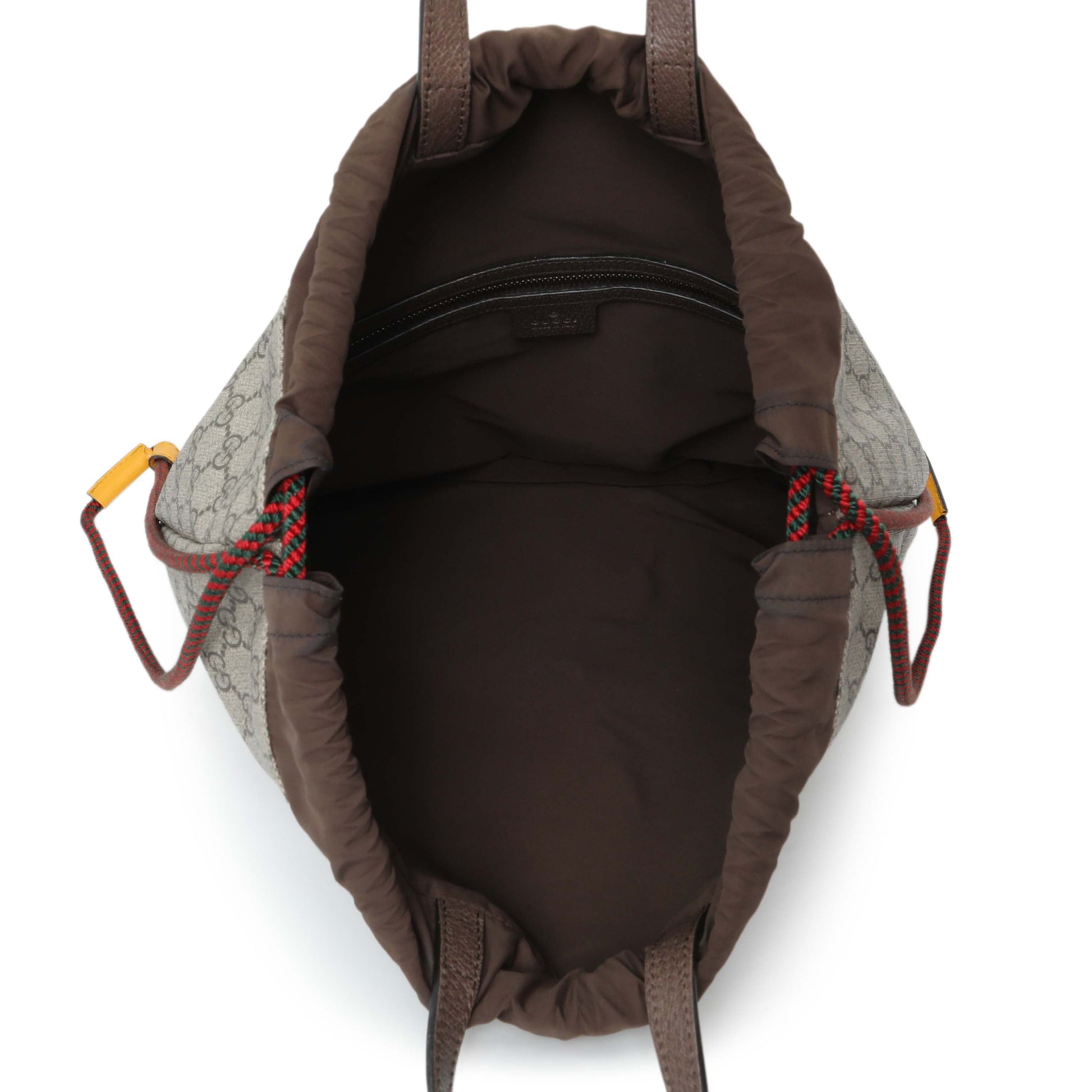 Exclusive Gucci GG Supreme Neo Vintage Drawstring Backpack — Lifestyle View