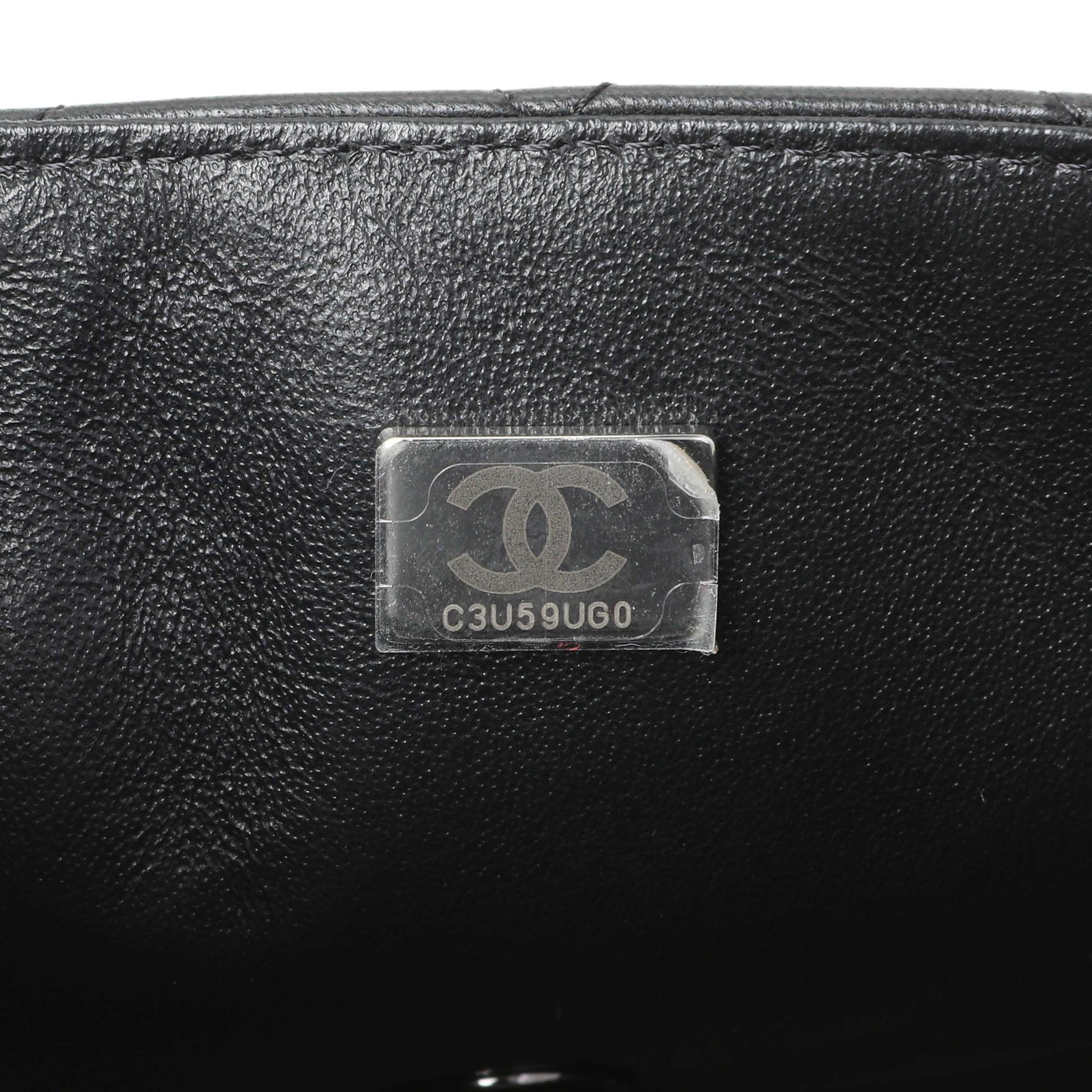 Exclusive Chanel Black Lambskin Mini Flap — Lifestyle View