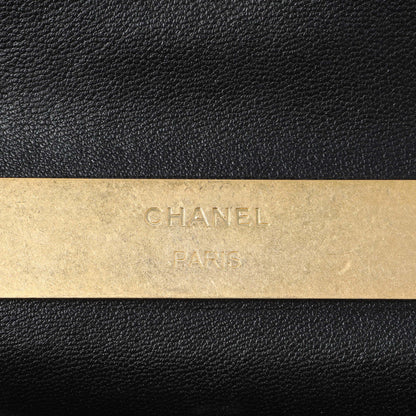 Exclusive Chanel Black Lambskin Enamel Quilted Mini Top Handle Flap — Lifestyle View