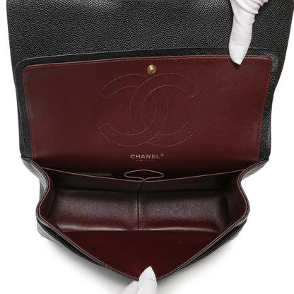 Exclusive Chanel Black Quilted Caviar Jumbo Classic Double Flap — Detail View