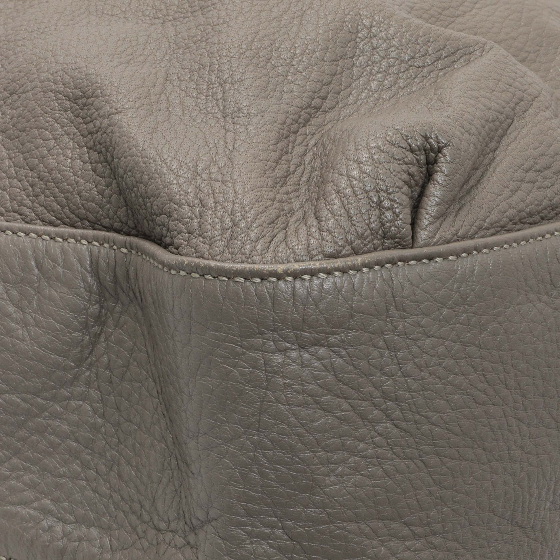 Exclusive Gucci Grey Calfskin G Wave Shoulder Bag — Lifestyle View