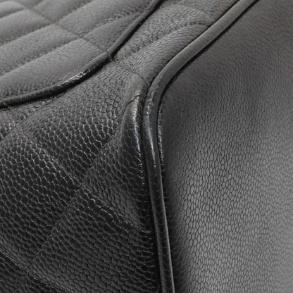 Exclusive Chanel Black Quilted Caviar Medallion Tote — Lifestyle View