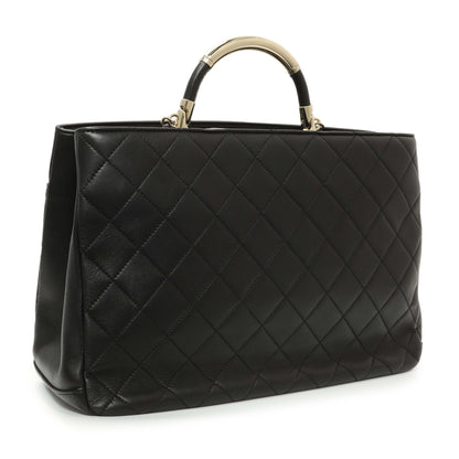 Exclusive Chanel Black Quilted Lambskin Large Carry Chic Shopping Tote — Side View