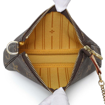 Exclusive Louis Vuitton Monogram Mini Pochette Accessories — Top View