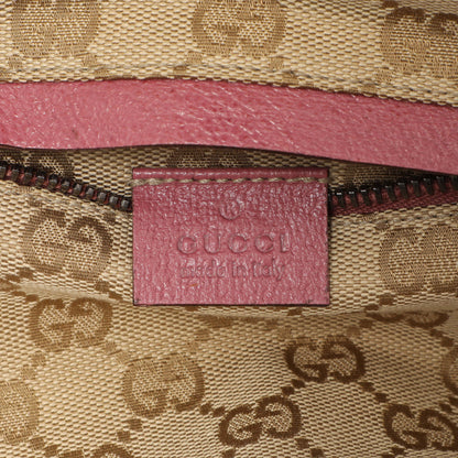 Exclusive Gucci Monogram Double Pocket Belt Bag — Lifestyle View