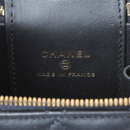 Exclusive Chanel Navy Lambskin Mini Vanity Case With Chain — Detail View
