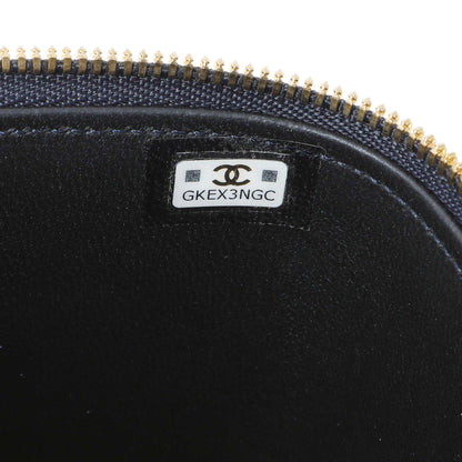 Exclusive Chanel Navy Lambskin Mini Vanity Case With Chain — Lifestyle View
