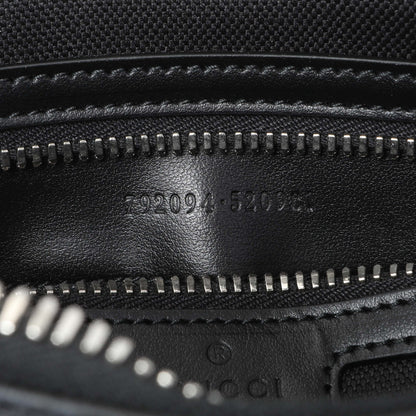 Exclusive Gucci Black GG Supreme Monogram Belt Bag — Lifestyle View