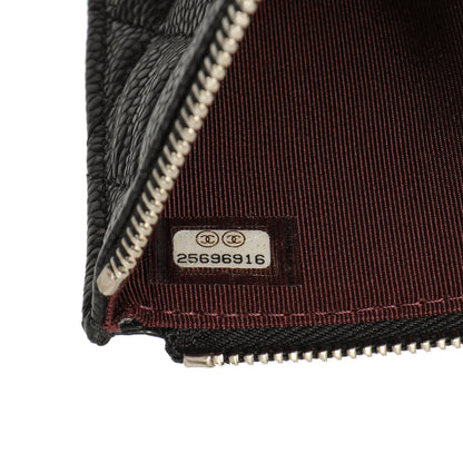 Exclusive Chanel Black Quilted Caviar Classic Zip Pouch — Lifestyle View
