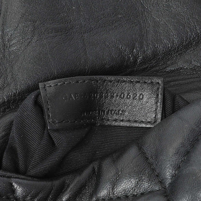 Exclusive Saint Laurent Black Lambskin Quilted Toy Loulou Puffer Monogram Chain Satchel — Lifestyle View