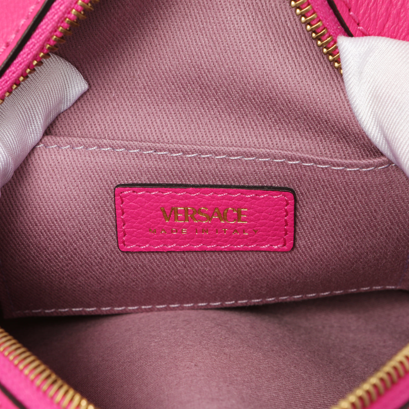 Exclusive Versace Fuchsia Calfskin La Medusa Mini Round Disco Chain Crossbody Bag — Lifestyle View