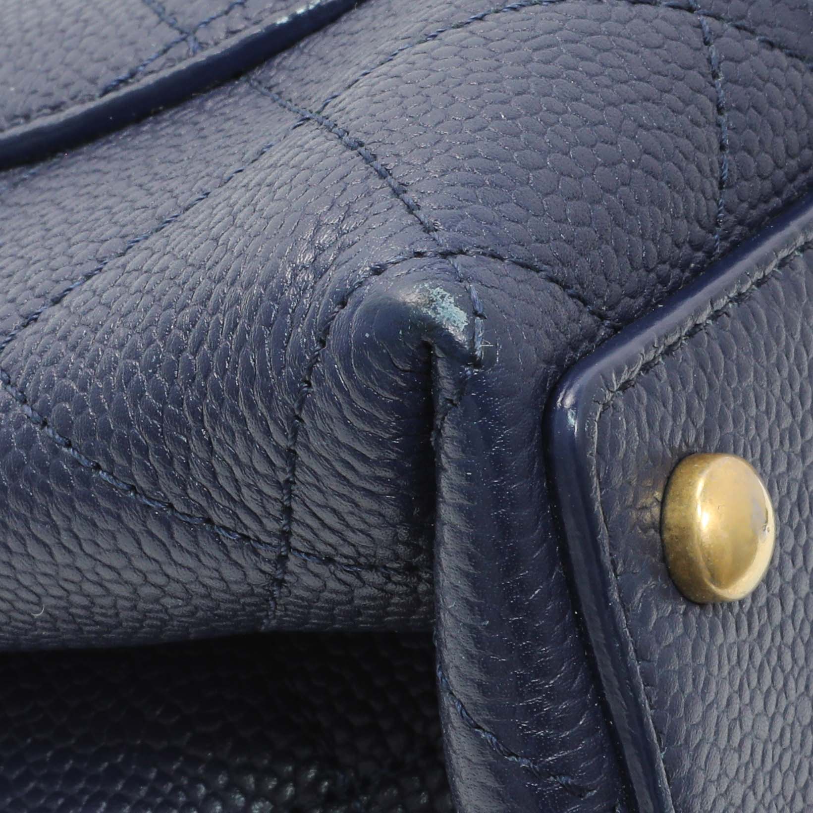 Exclusive Chanel Navy Blue Caviar City Walk Flap — Lifestyle View
