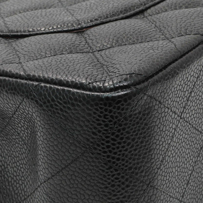 Exclusive Chanel Black Caviar Jumbo Classic Double Flap — Lifestyle View