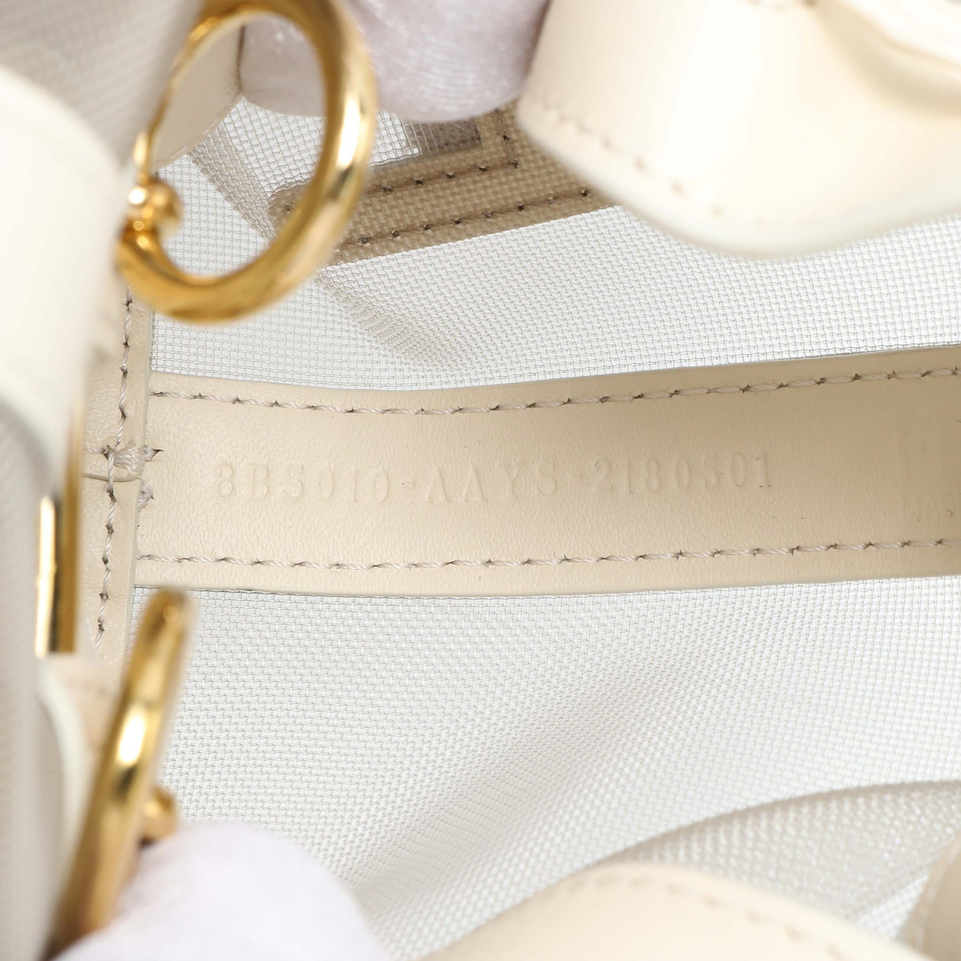 Exclusive Fendi Sabbia White Ice Mesh Vitello King F is Fendi Logo Embroidered Mini Mon Tresor Bucket Bag — Lifestyle View