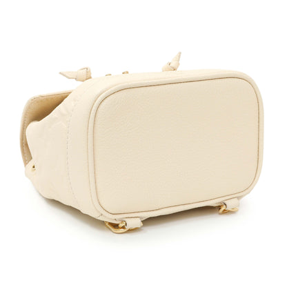 Exclusive Louis Vuitton Cream Empreinte Nano Noe Backpack — Side View