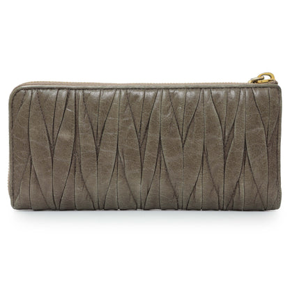Exclusive Miu Miu Grey Nappa Matelasse Zip Wallet — Side View