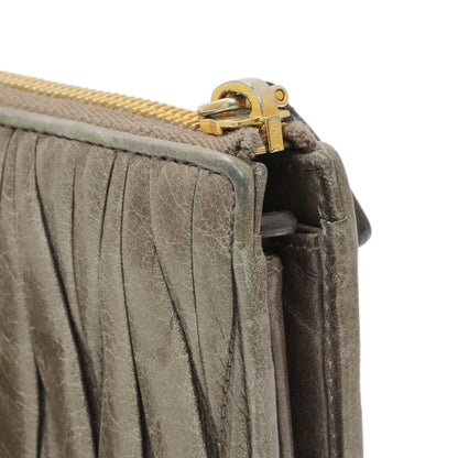 Exclusive Miu Miu Grey Nappa Matelasse Zip Wallet — Lifestyle View