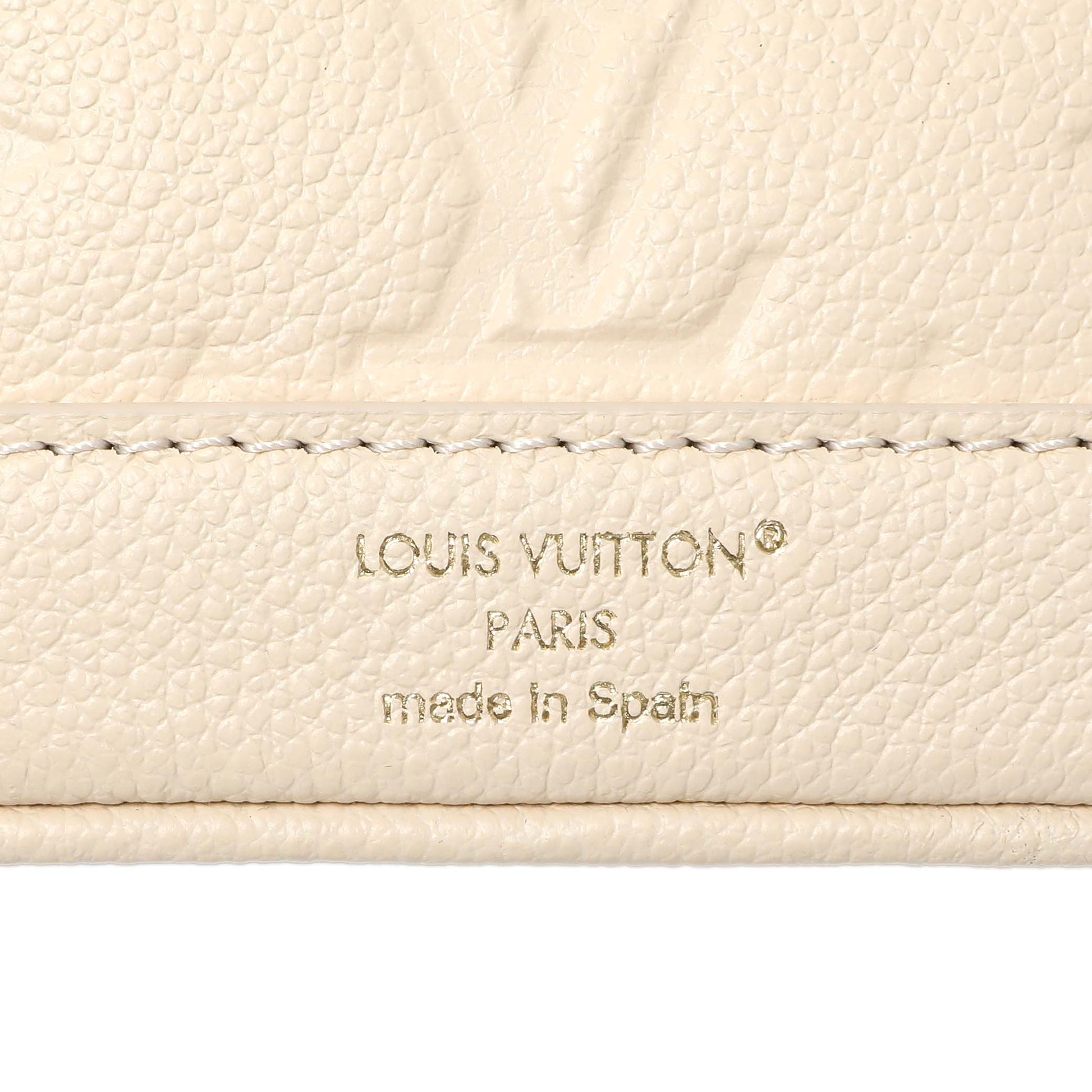 Exclusive Louis Vuitton Cream Empreinte Nano Noe Backpack — Detail View