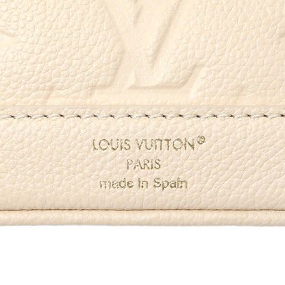 Exclusive Louis Vuitton Cream Empreinte Nano Noe Backpack — Detail View
