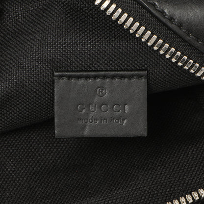 Exclusive Gucci Black GG Supreme Monogram Mini Messenger — Lifestyle View