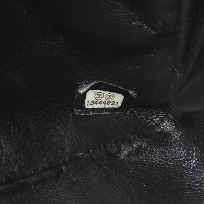 Exclusive Chanel Black Quilted Caviar Jumbo Single Flap — Lifestyle View