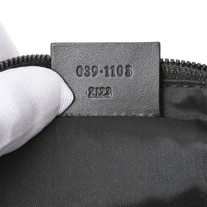 Exclusive Gucci Black Nylon Boat Pochette — Lifestyle View