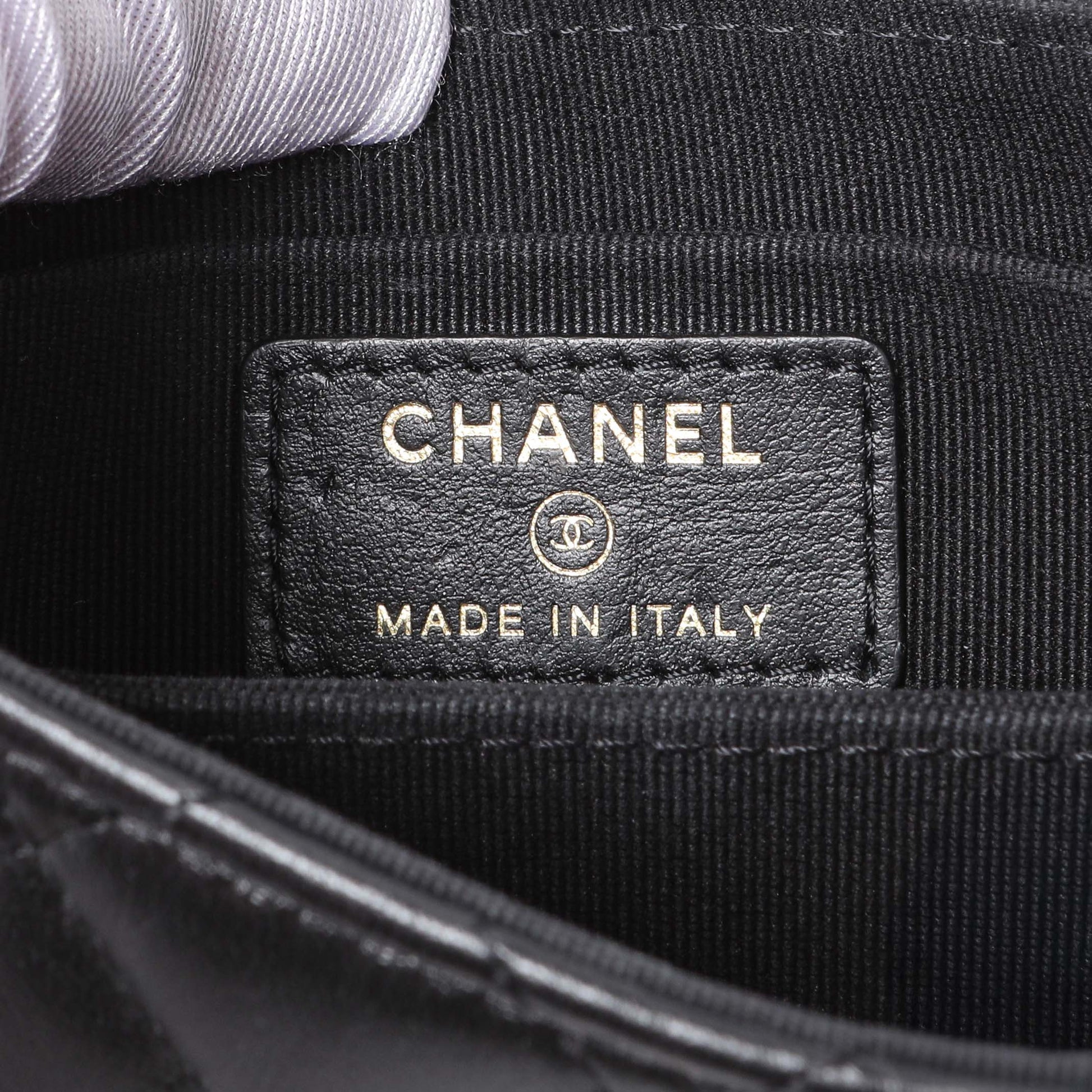 Exclusive Chanel Black Lambskin Quilted Mini Acccordion Clutch With Chain — Lifestyle View