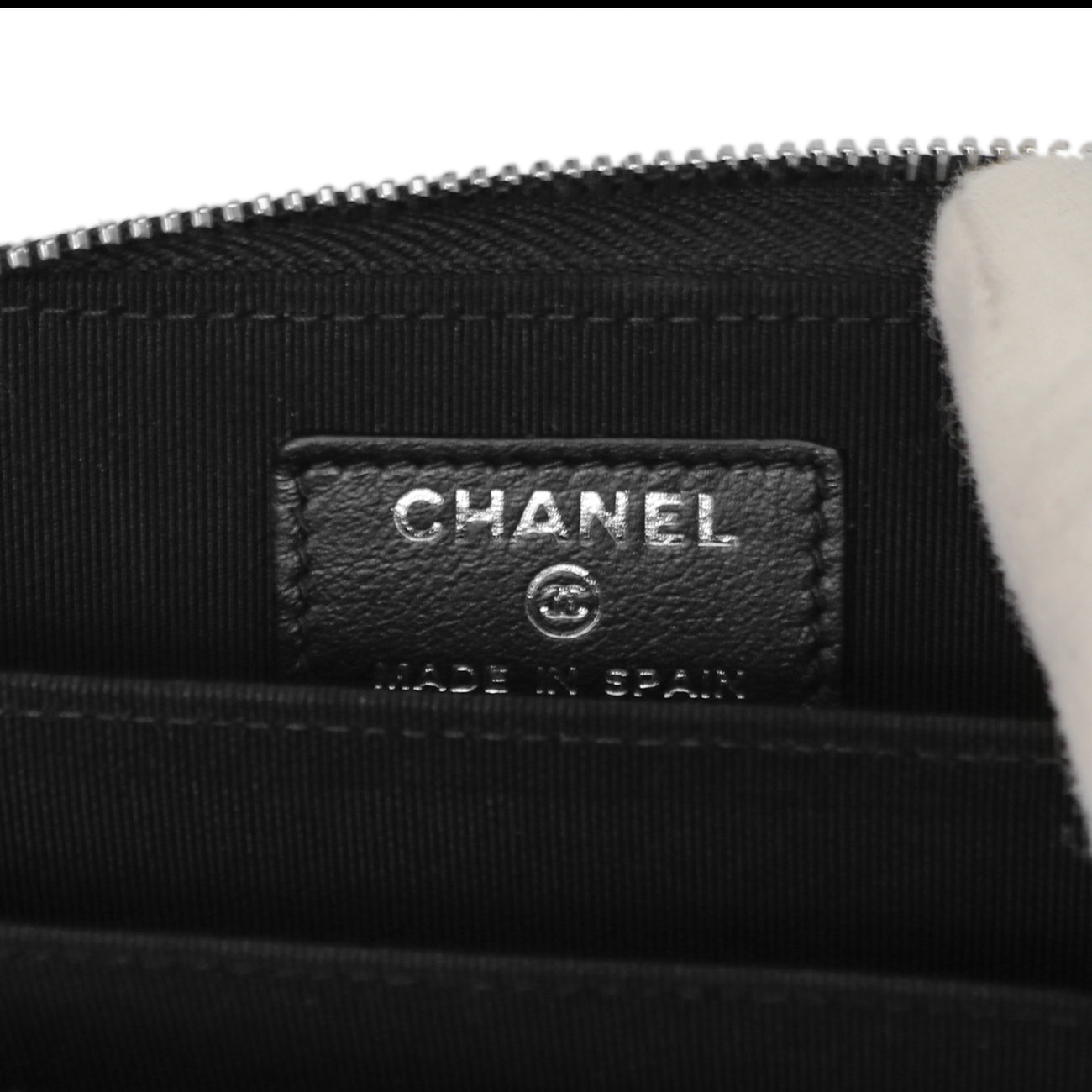 Exclusive Chanel Iridescent Black Quilted Caviar Zip Around Coin Purse — Lifestyle View
