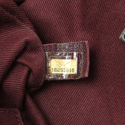Exclusive Chanel Burgundy Aged Calfskin Portobello Flap — Lifestyle View