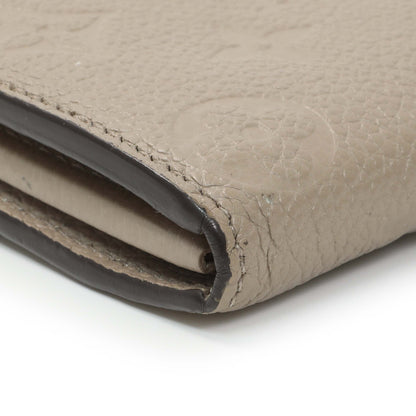 Exclusive Louis Vuitton Tourterelle Empreinte Sarah Wallet — Lifestyle View