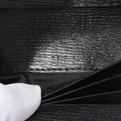 Exclusive Gucci Black Calfskin Vintage Compact Wallet — Lifestyle View