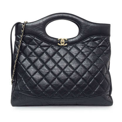 Exclusive Chanel Navy Quilted Aged Calfskin Large 31 Shopping Tote — Front View