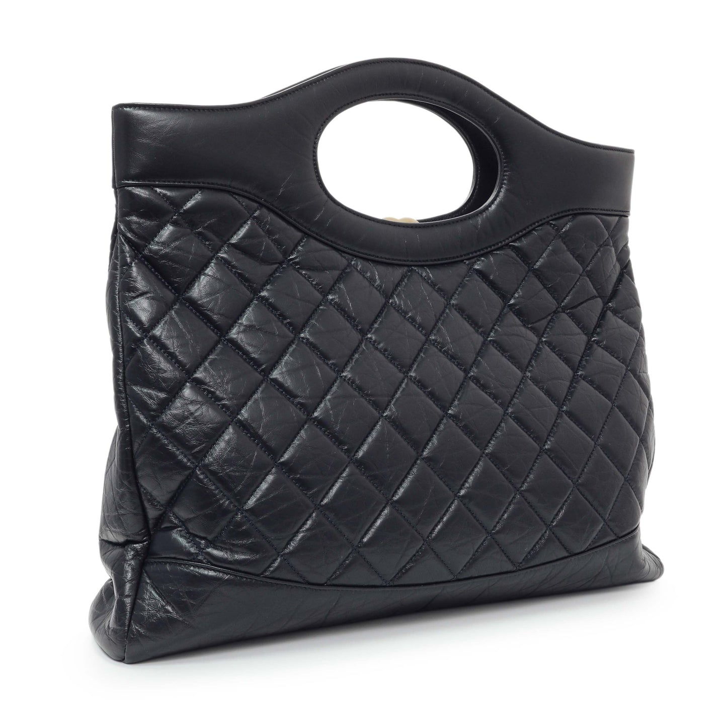 Exclusive Chanel Navy Quilted Aged Calfskin Large 31 Shopping Tote — Side View