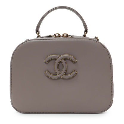 Exclusive Chanel Taupe Calfskin Coco Curve Vanity Case — Side View