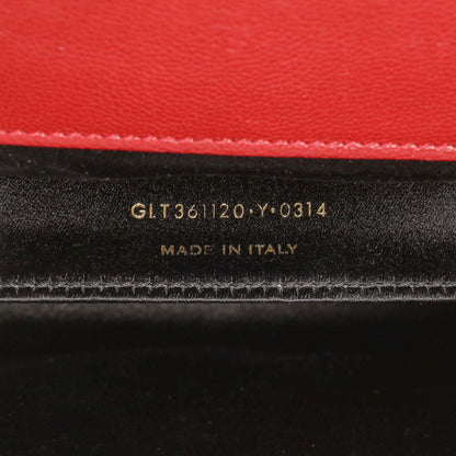 Exclusive Saint Laurent Red Calfskin Monogram Belle de Jour Clutch — Lifestyle View