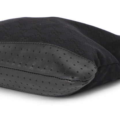 Exclusive Gucci Black Monogram Perforated Flat Messenger — Lifestyle View
