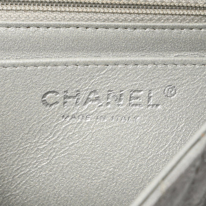 Exclusive Chanel Silver Metallic Patent Crumpled Calfskin Chevron Quilted Mini Square Flap — Lifestyle View