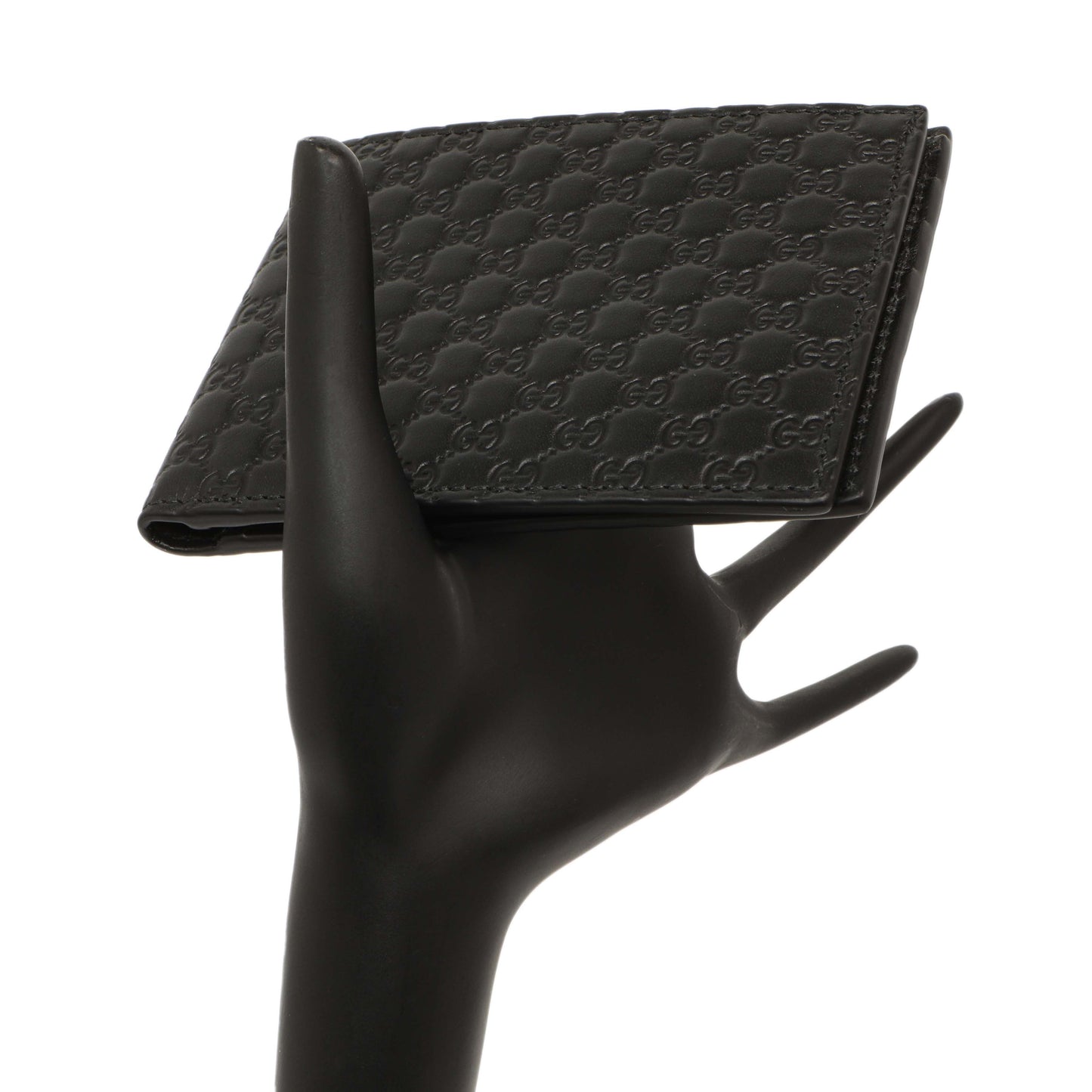 Exclusive Gucci Black Microguccissima Bi-Fold Wallet — Lifestyle View
