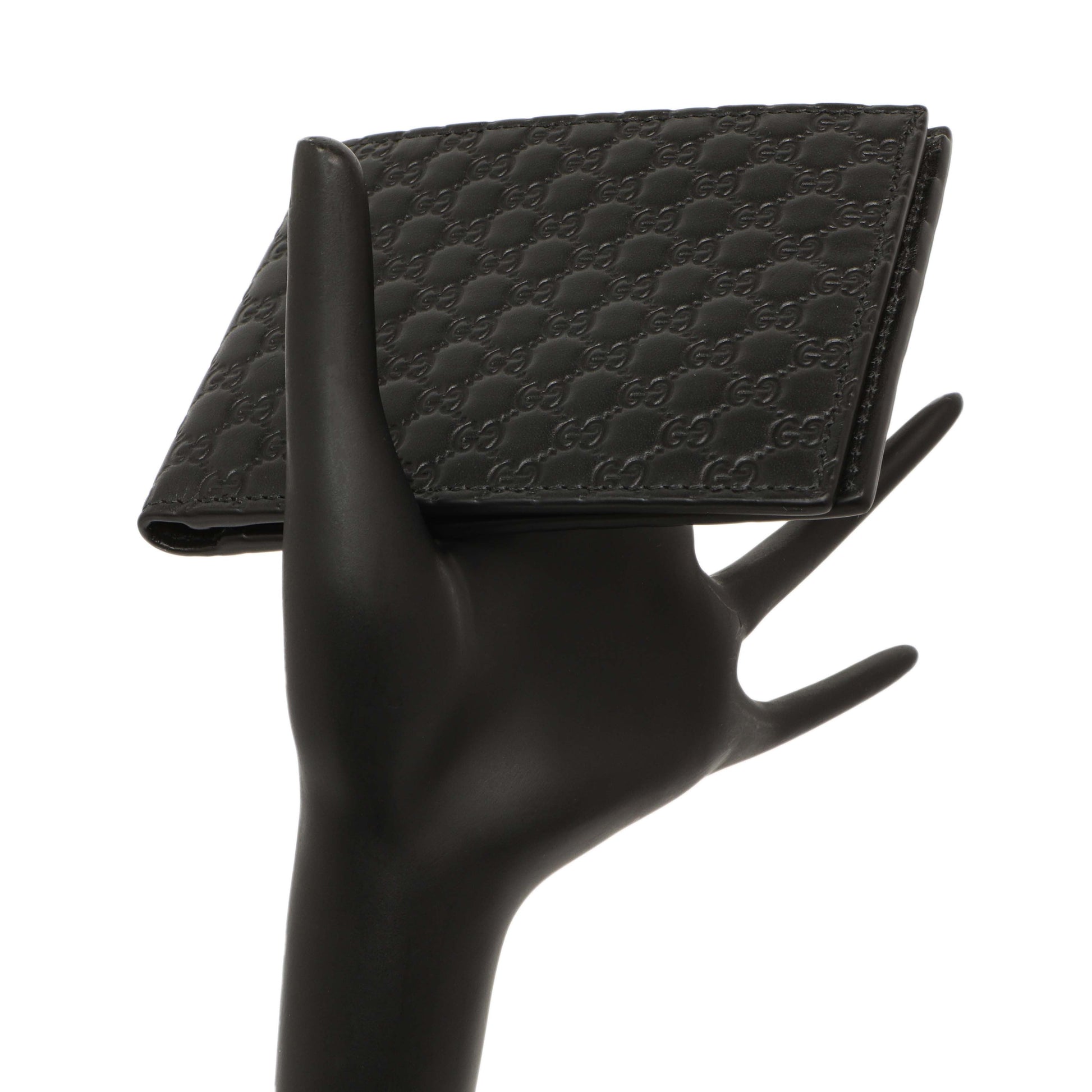 Exclusive Gucci Black Microguccissima Bi-Fold Wallet — Lifestyle View