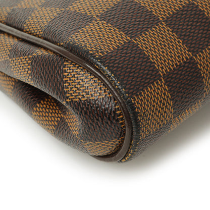 Exclusive Louis Vuitton Damier Ebene Eva Clutch — Lifestyle View