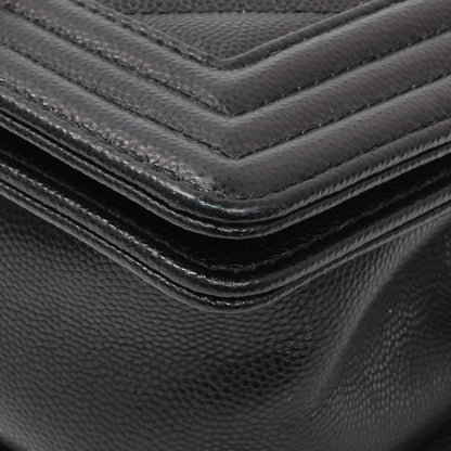 Exclusive Chanel Black Chevron Quilted Caviar Small Boy Flap — Lifestyle View