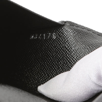 Exclusive Louis Vuitton Damier Graphite Passport Cover — Lifestyle View