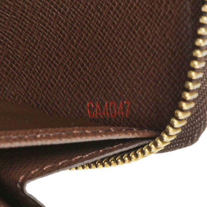 Exclusive Louis Vuitton Damier Ebene Zippy Wallet — Lifestyle View