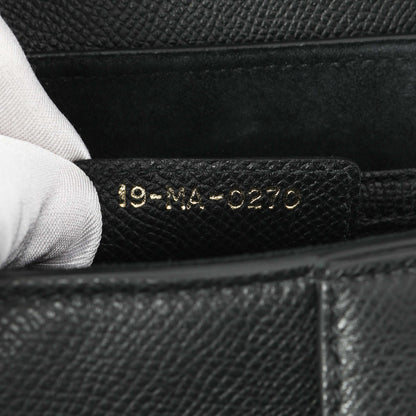 Exclusive Christian Dior Black Grained Calfskin Saddle Bag — Lifestyle View
