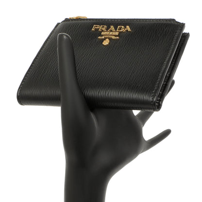 Exclusive Prada Black Vitello Move Double Zip Wallet — Lifestyle View