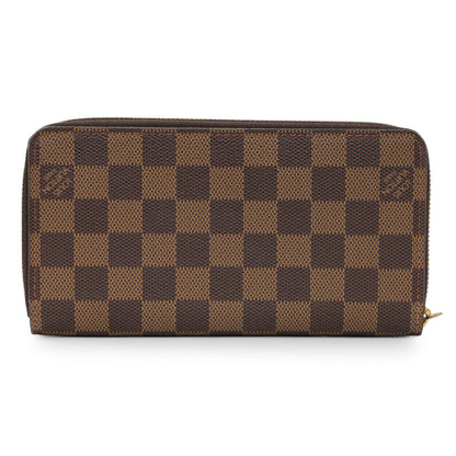 Exclusive Louis Vuitton Damier Ebene Zippy Wallet — Side View