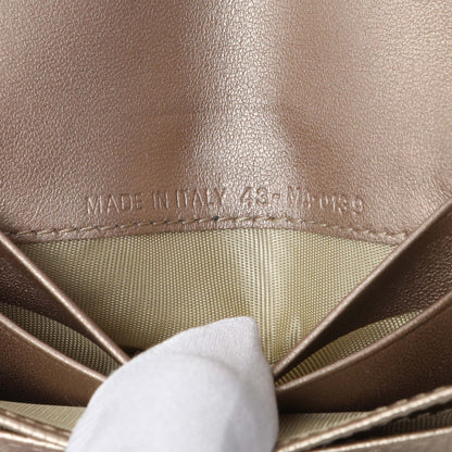 Exclusive Christian Dior Gold Metallic Grained Calfskin Saddle Card Holder — Lifestyle View