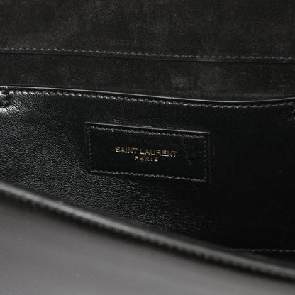 Exclusive Saint Laurent Black Patent Grain De Poudre Monogram Cassandre Clutch — Lifestyle View
