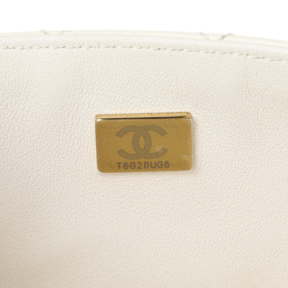 Exclusive Chanel White Quilted Aged Calfskin 2.55 Reissue Flap 224 — Lifestyle View